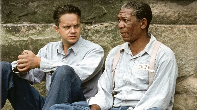 Tim Robbins Morgan Freeman sitting against wall The Shawshank Redemption