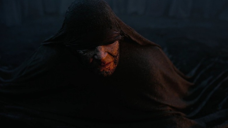 James Remar as Tiresias covereed in his cloak in The Odyssey