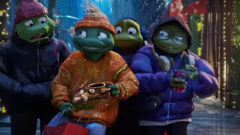 The turtles look in disbelief at Mikey's Christmas gift for Splinter in Teenage Mutant Ninja Turtles: Chrome Alone 2