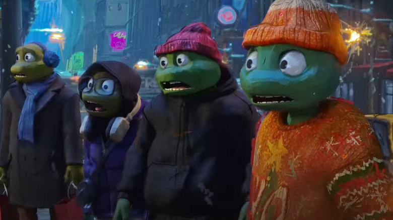 The turtles look confused and astonished at what they're looking at in the streets of New York in Teenage Mutant Ninja Turtles: Chrome Alone 2