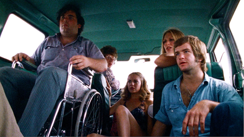 Paul A. Partain, Allen Danziger, Teri McMinn, Marilyn Burns, and William Vail look terrified while driving in The Texas Chain Saw Massacre