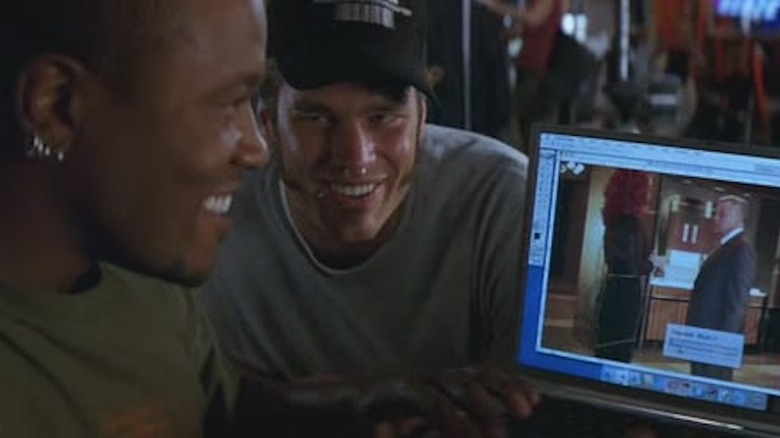 Lawyer Milloy as Computer Geek #1 and Tom Brady as Computer Geek #2 toy with Cher's appearance in Stuck on You
