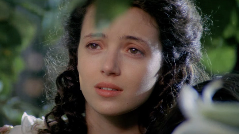 Mia Sara as Lili staring in a forest in Legend (1985)
