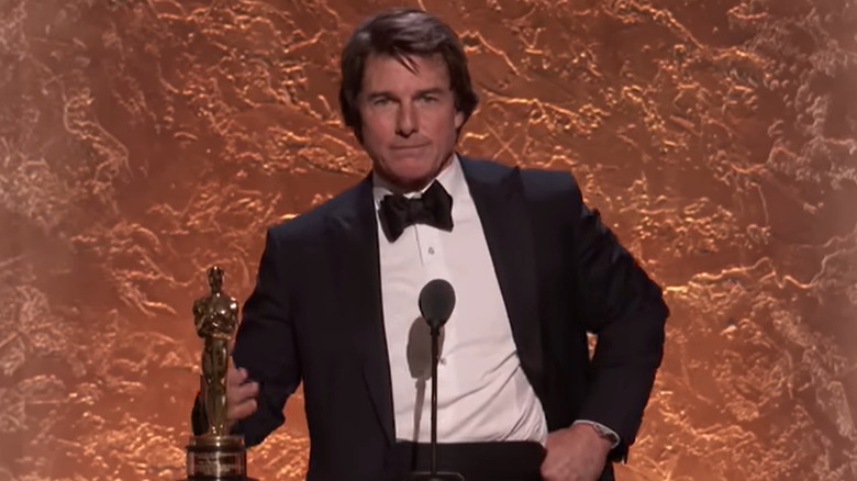 Tom Cruise accepting an Oscar at the Governors Awards