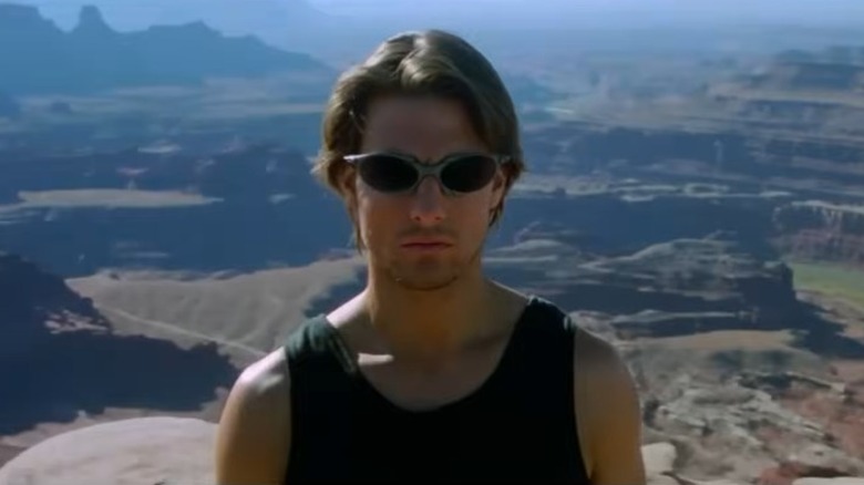 Tom Cruise as Ethan Hunt wearing glasses for Mission: Impossible 2