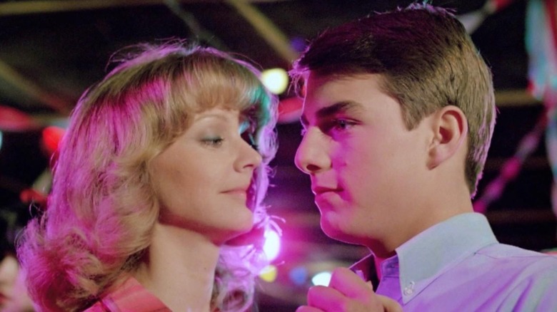 Shelley Long as Kathy and Tom Cruise as Woody hook up at a club in Losin' It