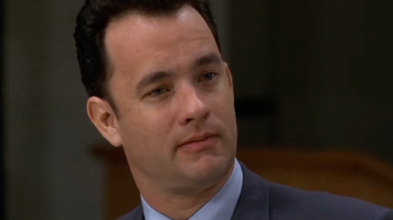Tom Hanks as Mr. Amos White looking unimpressed in That Thing You Do!