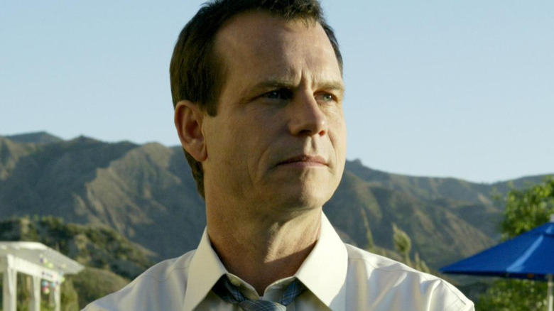Bill Paxton as Bill Henrickson looking serious on Big Love