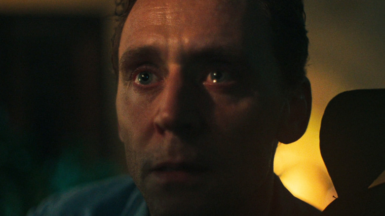 Tom Hiddleston's Jonathan Pine is teary eyed in closeup in The Night Manager