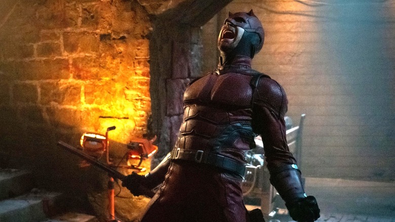 Charlie Cox as Daredevil with his arms out screaming in Daredevil: Born Again