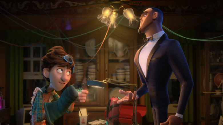 Tom Holland's Walter Beckett stands opposit Will Smith's Lance Sterling in a dining room in Spies in Disguise