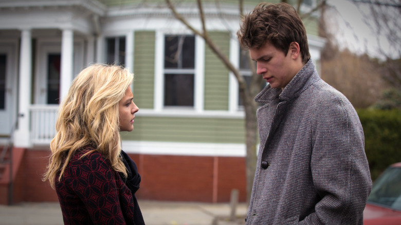 Digger and Addison chatting out in the street in November Criminals