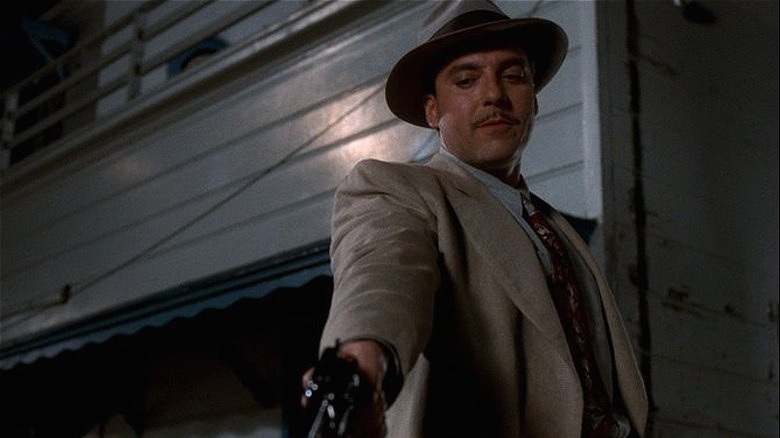 Albright aims his gun
