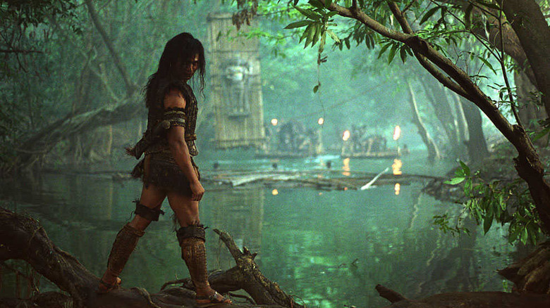 Tien (Tony Jaa) stands by a river in Ong Bak 2: The Beginning (2008)
