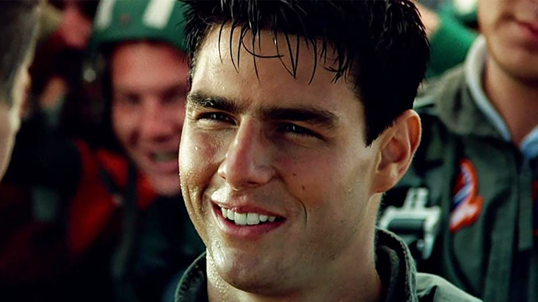 Tom Cruise as Maverick smiling at the end of Top Gun