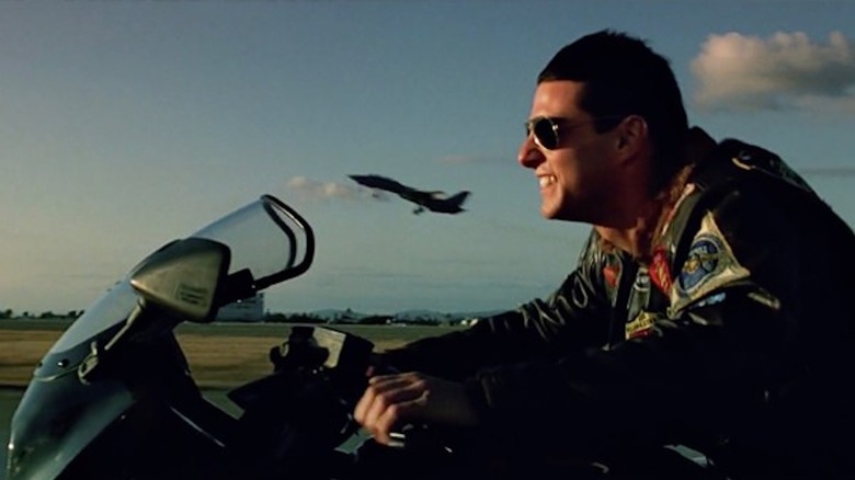 Tom Cruise speeds on a Kawasaki Ninja as Pete "Maverick" Mitchell in Top Gun