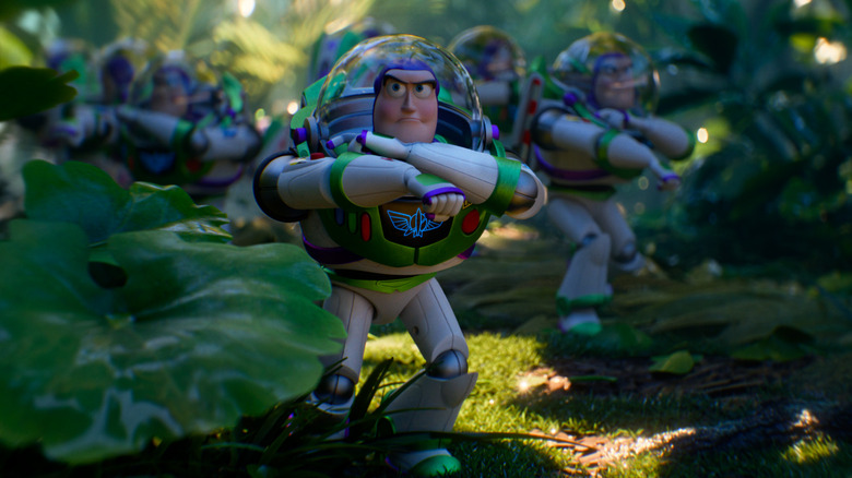 An army of Hi-Tech Buzz Lightyears explores a forest in Toy Story 5