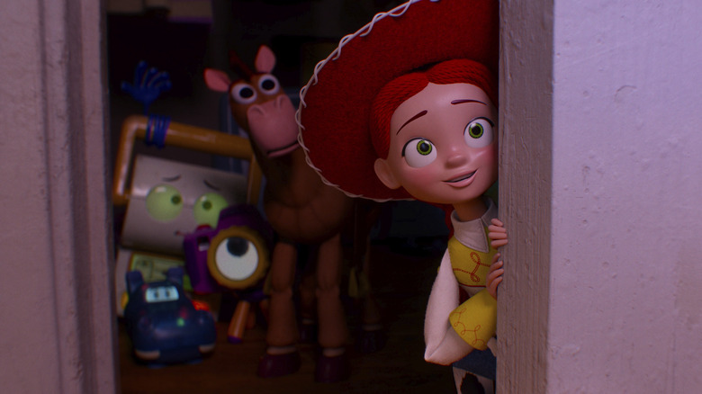 Jessie hides behind a door with Bullseye, Atlas, Mr. Smarty Pants, and Snappy in Toy Story 5