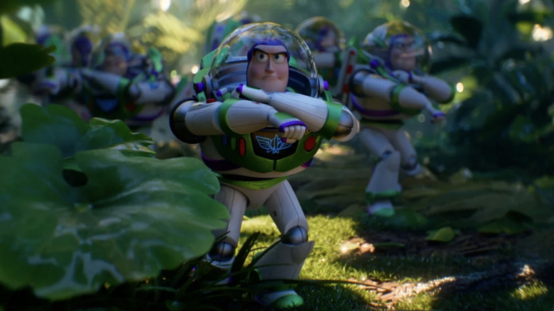 An army of Buzz Lightyear Hi-Tech toys moving through a forest in Toy Story 5