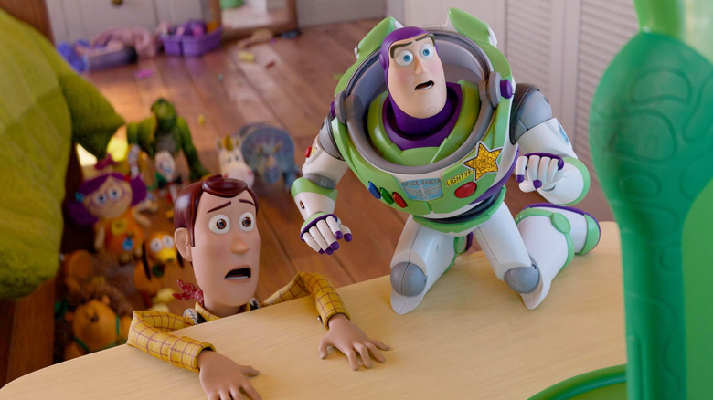 Woody and Buzz staring in shock at Lilypad in Toy Story 5