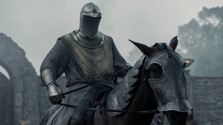 Ser Duncan the Tall in his full armor and helmet atop his horse in A Knight of the Seven Kingdoms