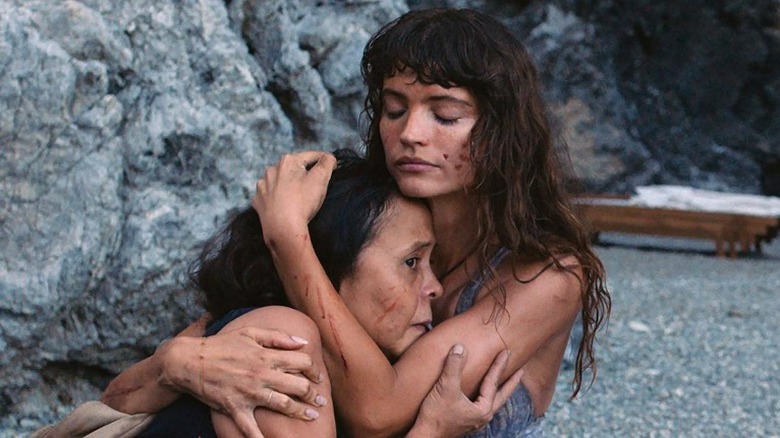 Charlbi Dean and Dolly De Leon in Triangle of Sadness