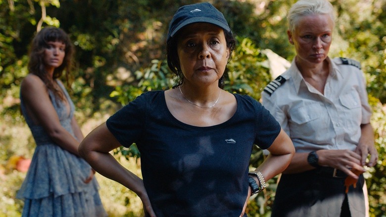 Charlbi Dean, Dolly De Leon, and Vicki Berlin in Triangle of Sadness