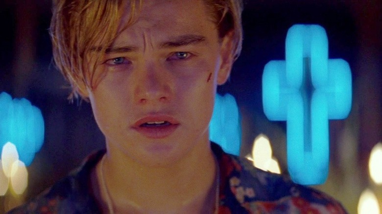 distraught blonde man with a cut on his cheek