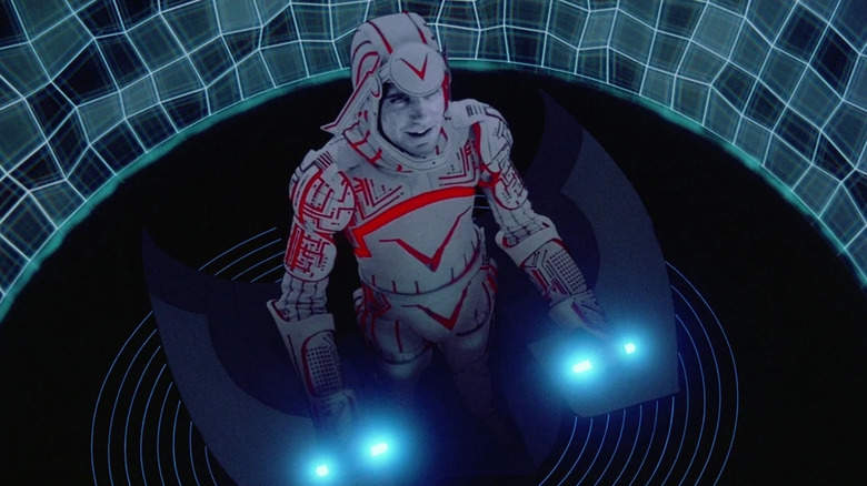 David Warner as Sark at a control panel in the grid in Tron: Ares