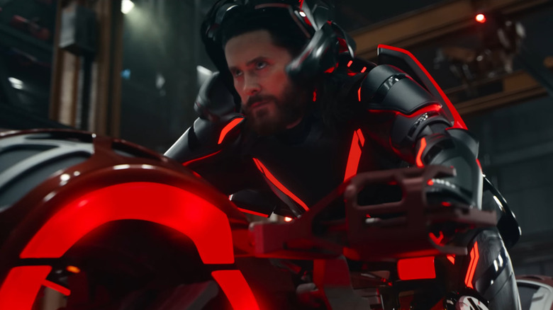Jared Leto as Ares suiting up on a Lightcycle in Tron: Ares