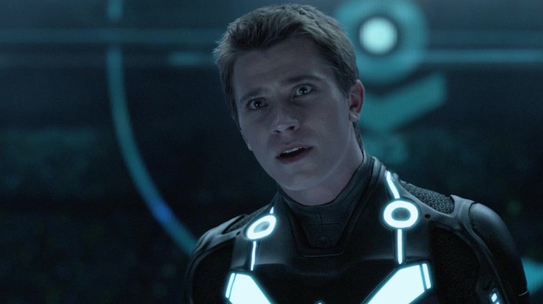 Garrett Hedlund as Sam Flynn looking amazed in Tron: Legacy