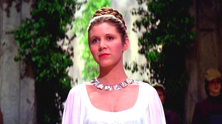 Princess Leia wearing a white dress