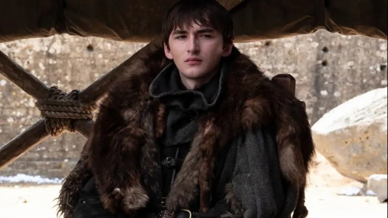 Bran (Isaac Hempstead Heath) sits under a leather tarp in the finale of Game of Thrones