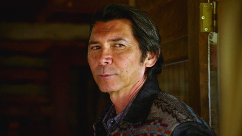 Henry smiling in his doorway in "Longmire" Season 4