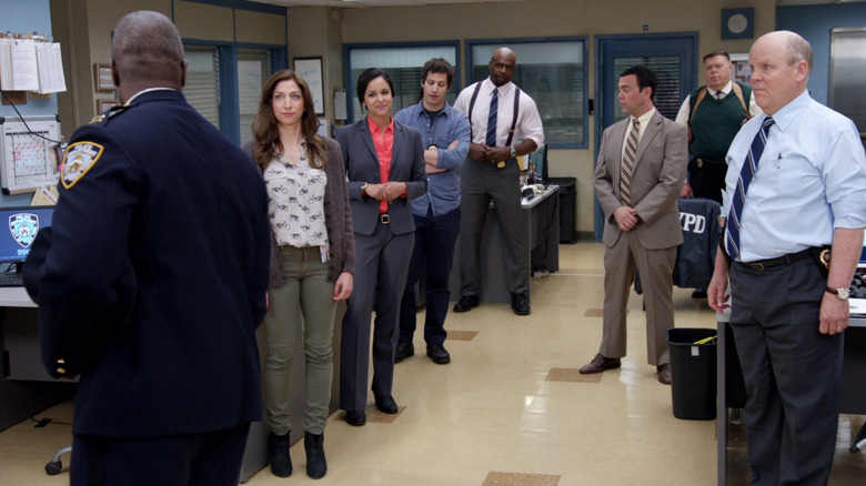 The department meets Captain Holt (Andre Braugher)