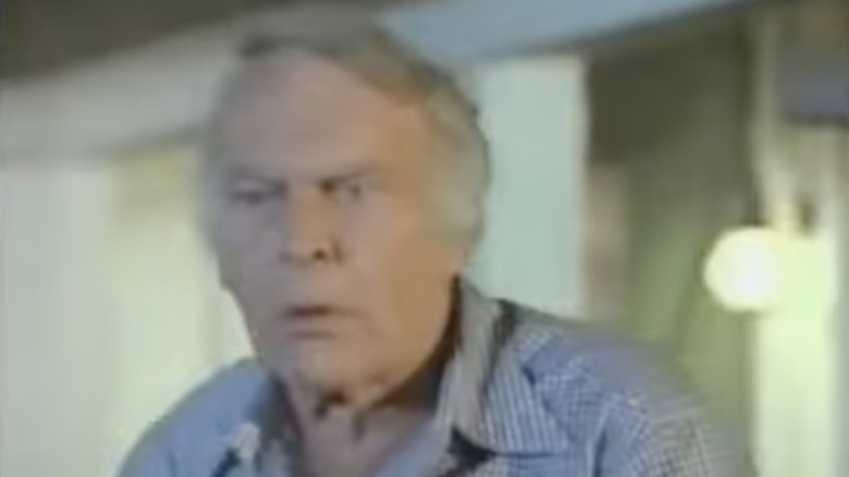 Leif Erickson confronts what he believes to be aliens outside of his house in Project U.F.O.