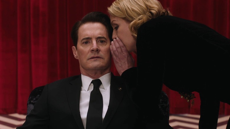 Laura Palmer whispers in Dale Cooper's ear in Twin Peaks: The Return