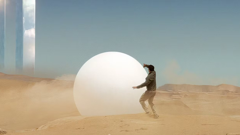 Number 6 being stalked by a Rover in The Prisoner