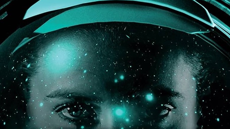 Jazz in her helmet among the stars on the cover of Artemis
