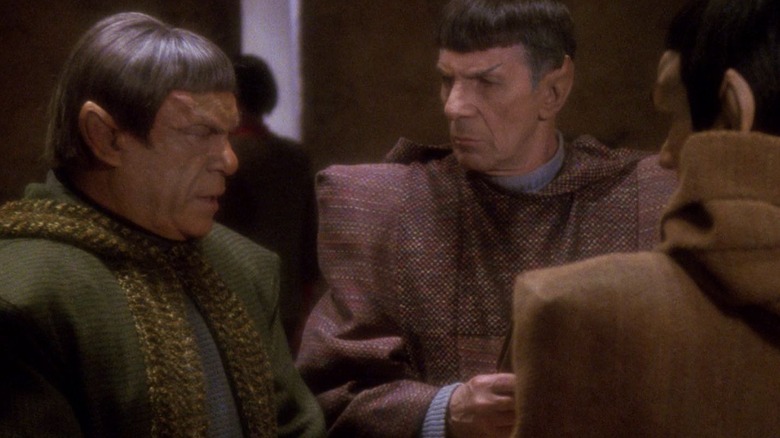 A Romulan commander and Spock talking on Star Trek: The Next Generation