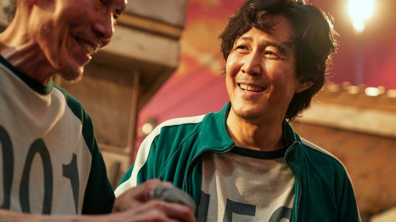 Gi-hun enjoys a moment with 001