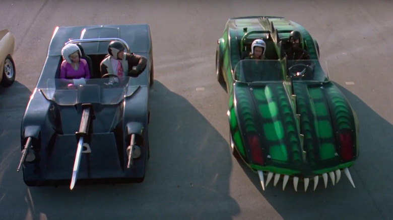 Two cars lined up to start race