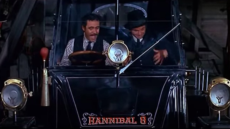 Maximillian Mean and Professor Fate in a car