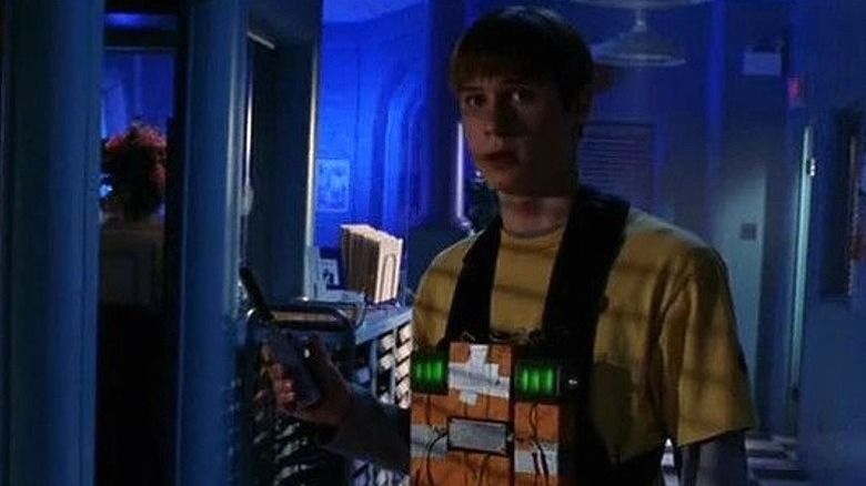 Garrett with bomb strapped to chest