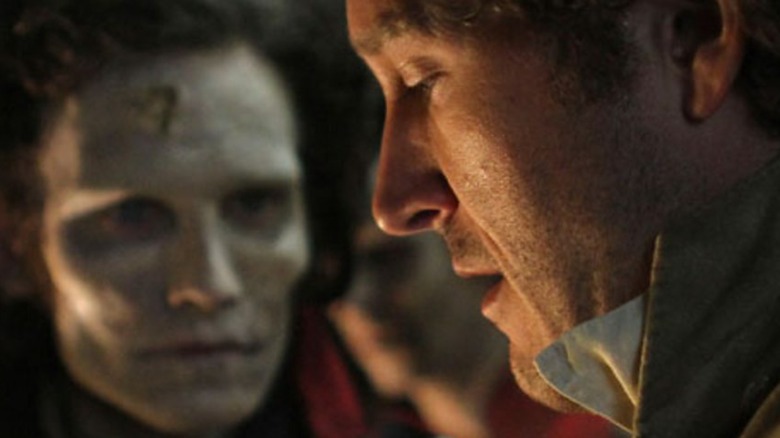 A ghastly being stares at Jonathan Strange