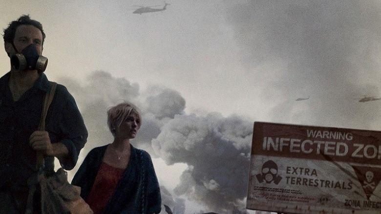 Two people wander through the infected zone