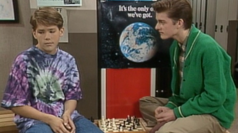 Fifteen: Ryan Reynolds as Billy in tie-dye shirt, forlorn with Olaf
