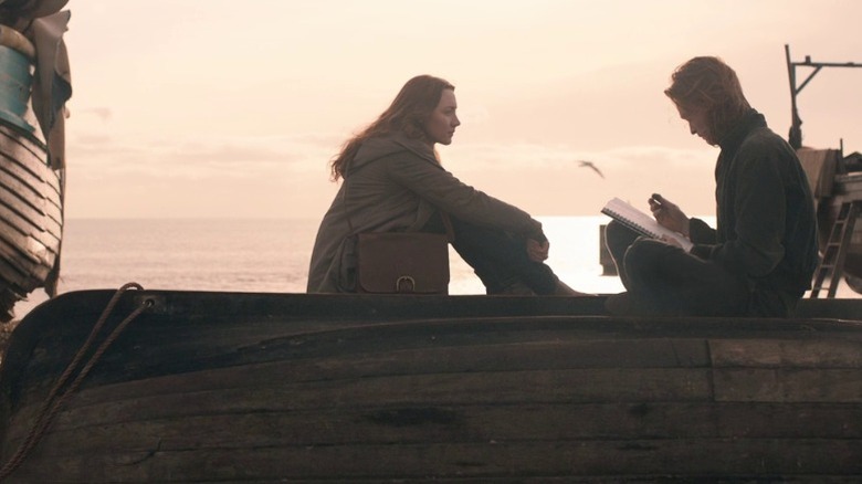 Eleanor and Frank sit and talk