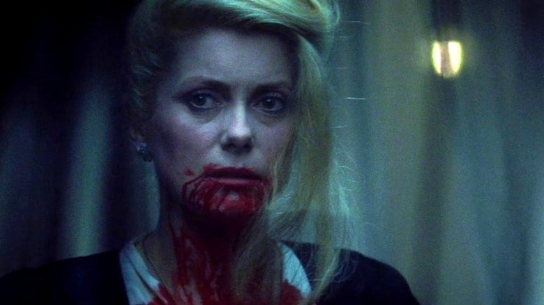 Miriam with blood running down from her mouth