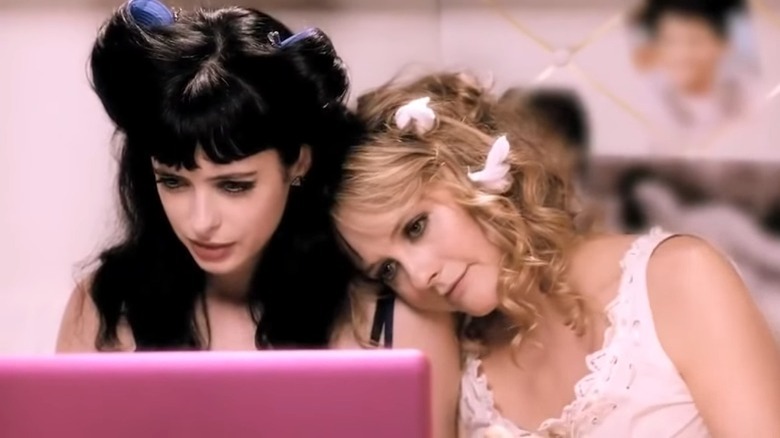 Goody rests her head on Stacy's shoulder